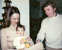 Little Elizabeth with her birth mother and dad.